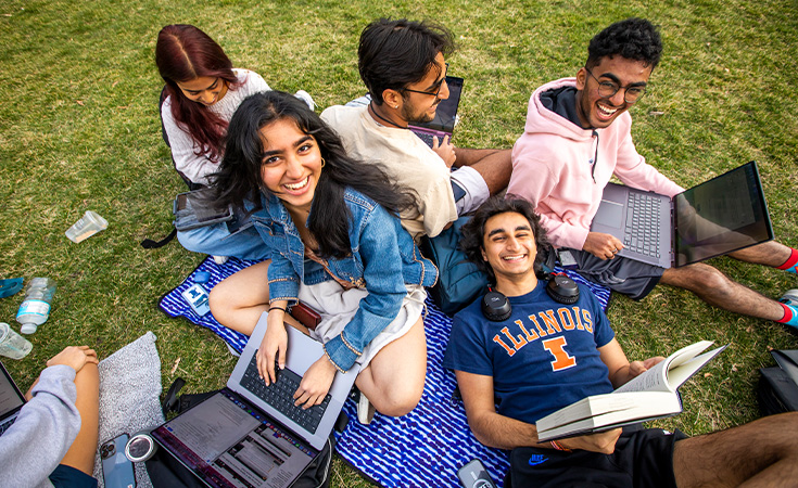 group of friends studying together on the Quad