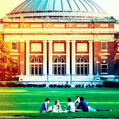 a group of Illinois students on the Quad in front of Foellinger Auditorium