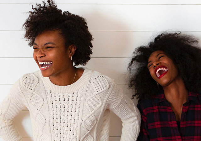 two girls laughing