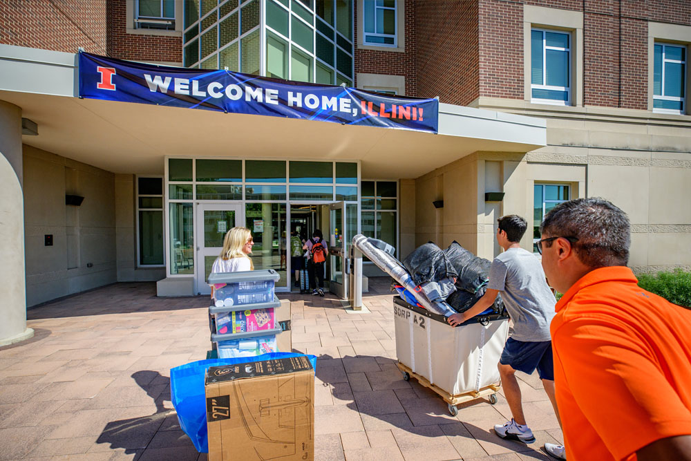 family helps their son move-in to Wassaja Hall with University Housing