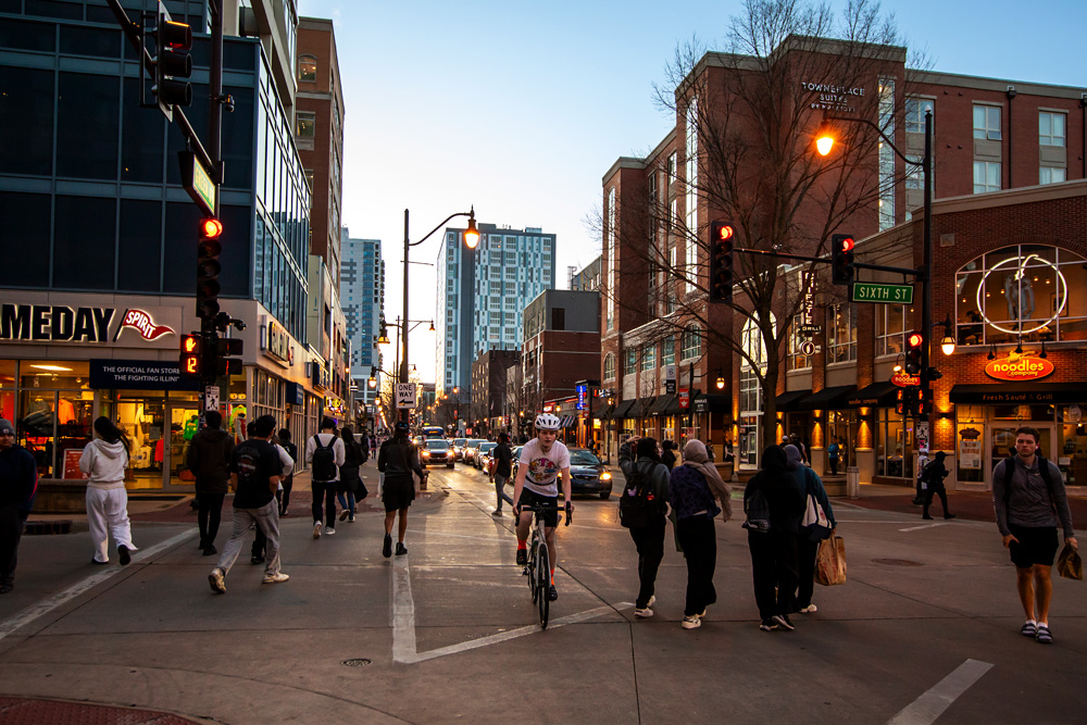 students walk, bike, and drive Green Street, a main thoroughfare on campus and which connects Champaign and Urbana