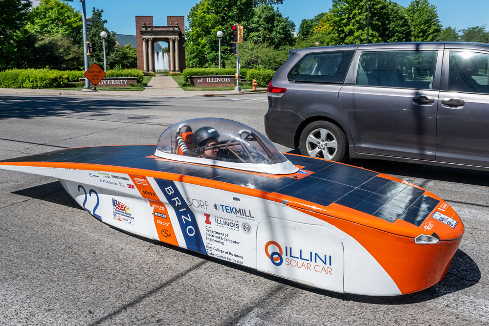 the Illini Solar Car driving on campus as it prepares for the American Solar Challenge