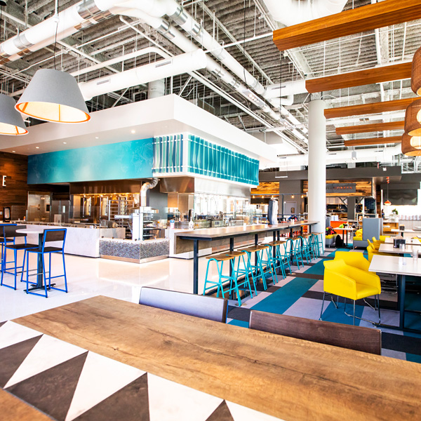 view of the colorful dining area and selection of restaurants inside the Illinois Street Residence Hall
