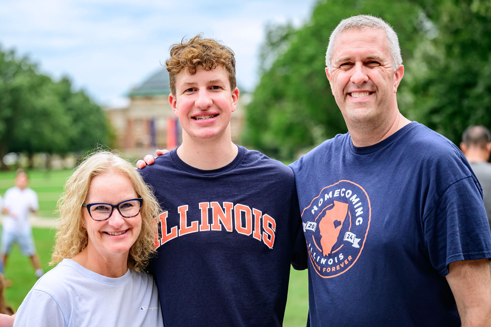 parents with son attend at family send-off event outside the Illini Union