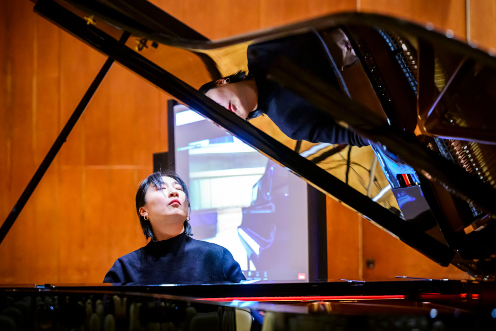 graduate piano student performs in the Foellinger Great Hall at Krannert Center for the Performing Arts