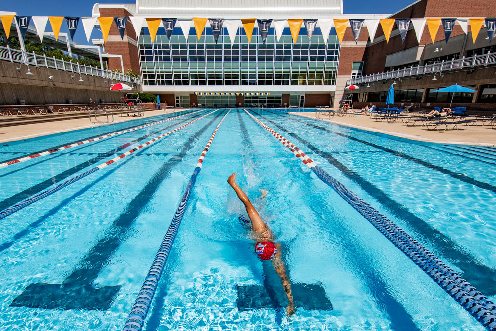 student swimming laps in the Activities and Recreation Center's outdoor olympic-sized pool