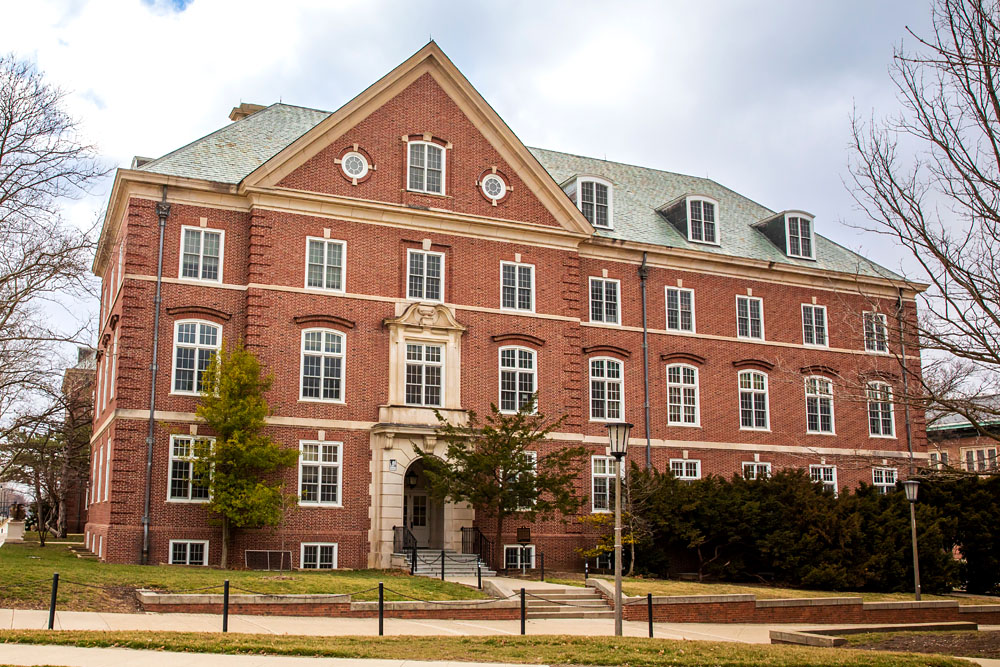 Gregory Hall's east entrance, nestled between the Main Library and Foellinger Auditorium